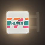 7 Heaven Magnet Light by Pinbuds, lit up in the dark