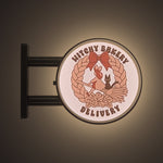 Bakery Delivery Magnet Light by Pinbuds, lit up in the dark