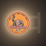 Hard Rocky Cafe Magnet Light by Pinbuds, lit up in the dark