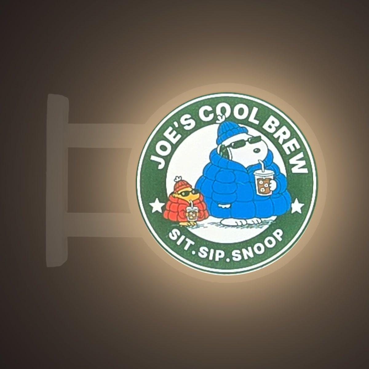 Joe's Cool Brew Magnet Light by Pinbuds, lit up in the dark