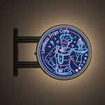 Limitless Frojo Cafe Magnet Light by Pinbuds, lit up in the dark