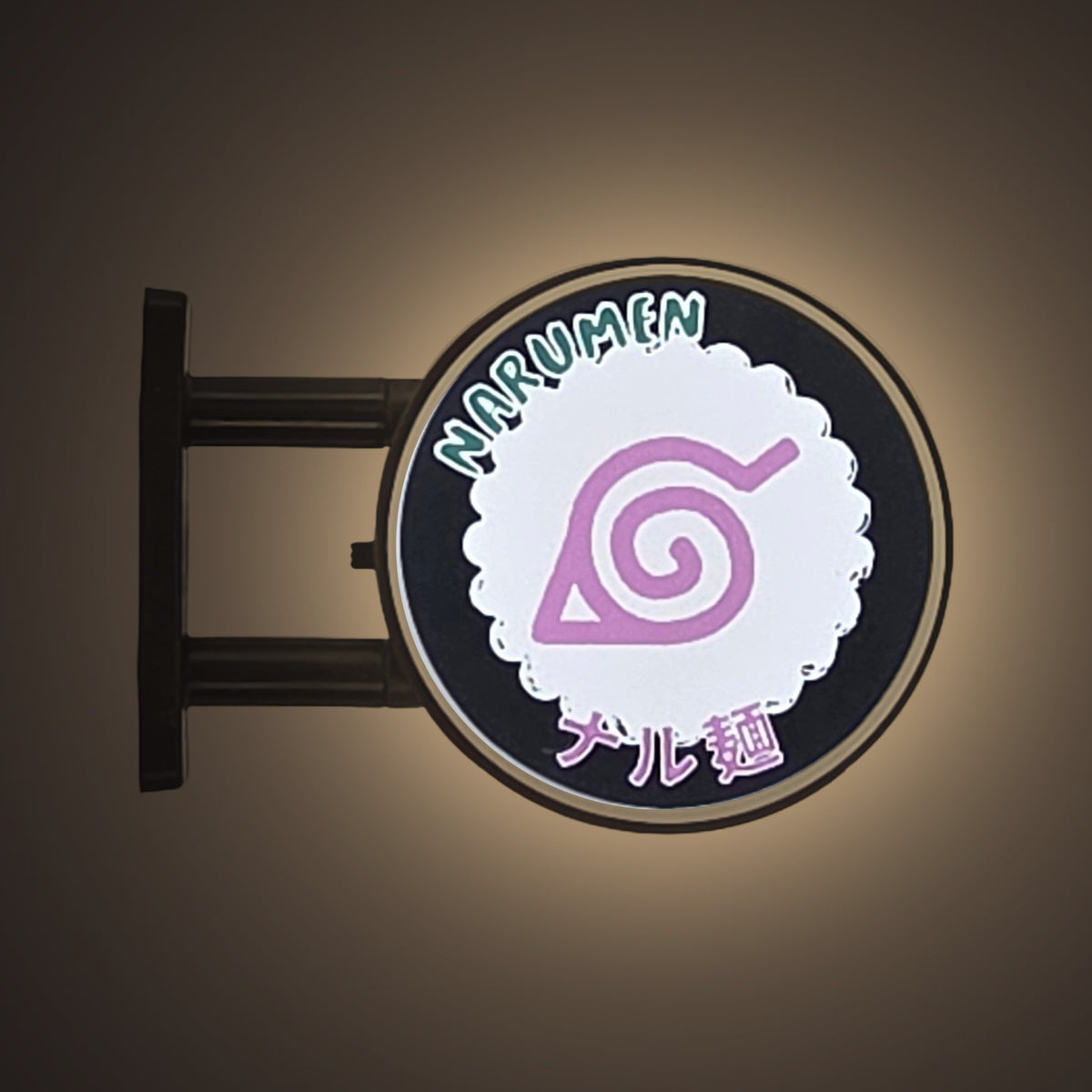 Narumen Magnet Light by Pinbuds, lit up in the dark
