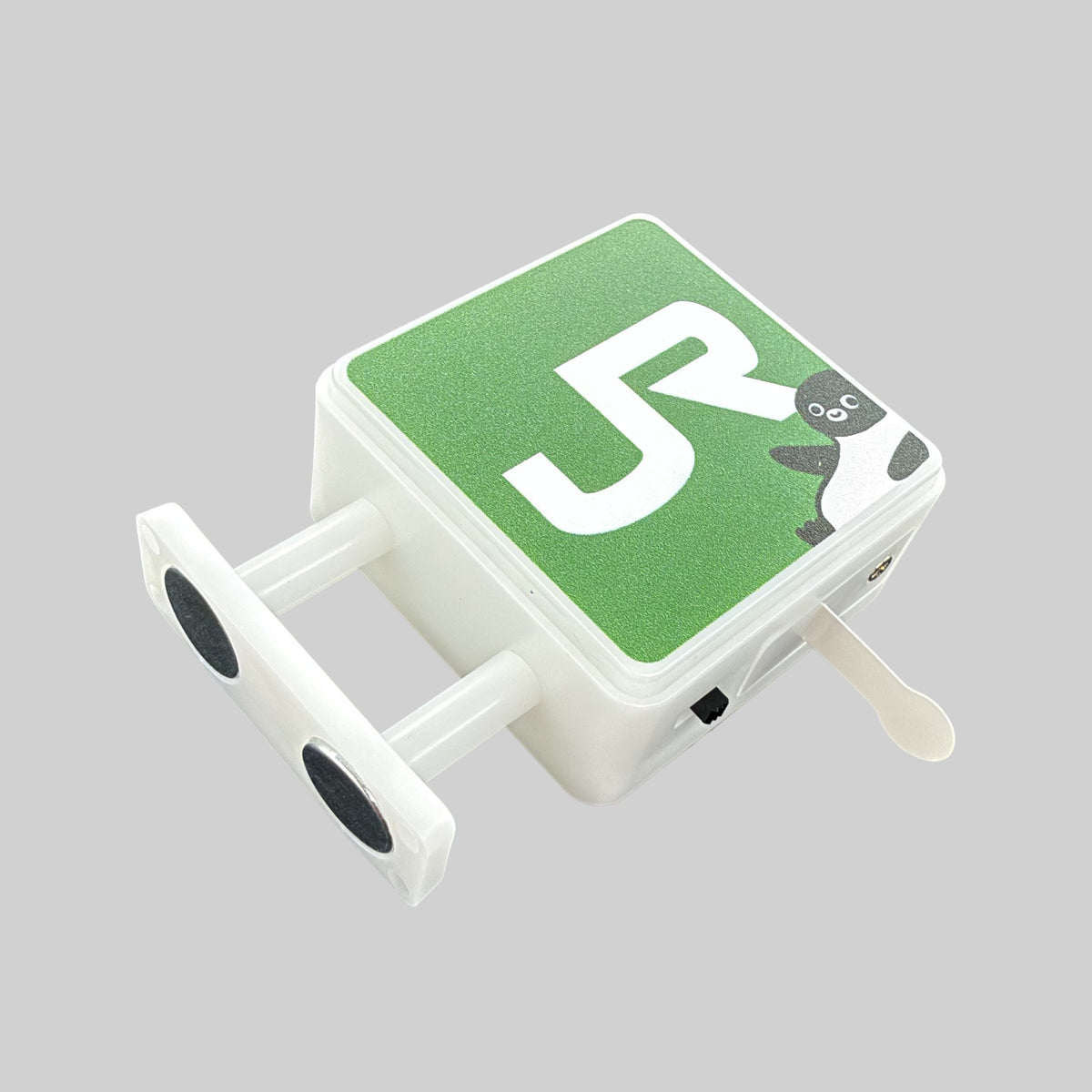 Penguin Station Magnet Light by Pinbuds, angled view 1 of 2