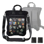 15" 3-Way Cotton ITA bag in black: front with a pin-filled clear window and padded shoulder strap, back view with tuck-away backpack straps, and two hook and loop pin pads