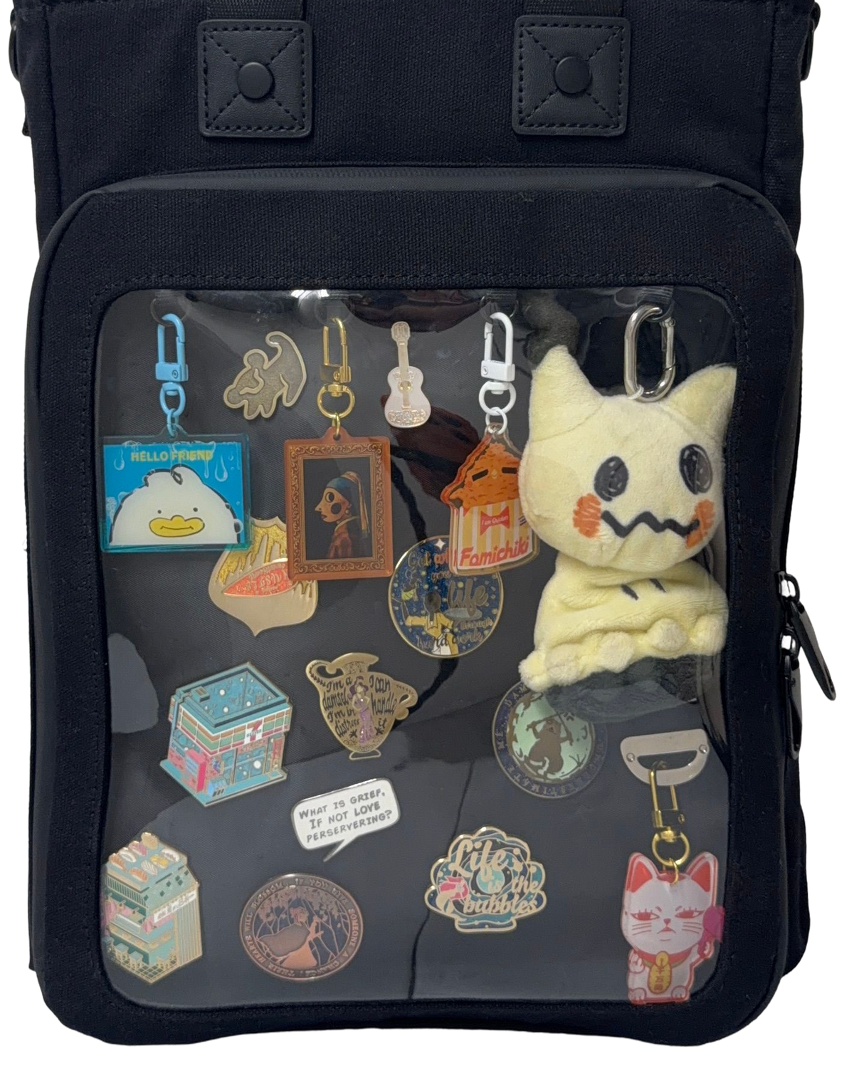 Cotton Convertible ITA Bag 15", black: close-up of the pin window filled with pins and charms, cut out