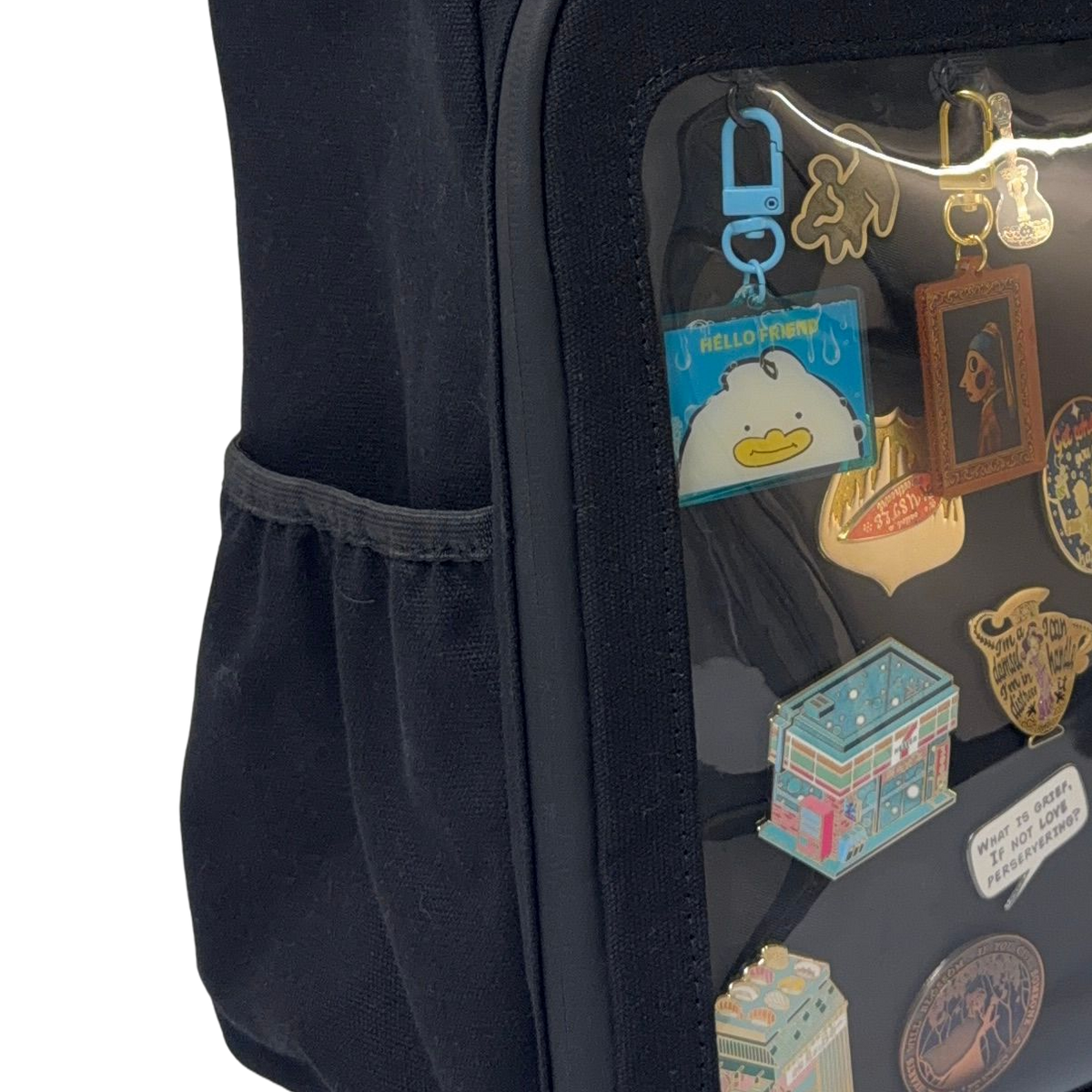 Cotton Convertible ITA Bag 15", black: close-up of the side bottle pocket, cut out
