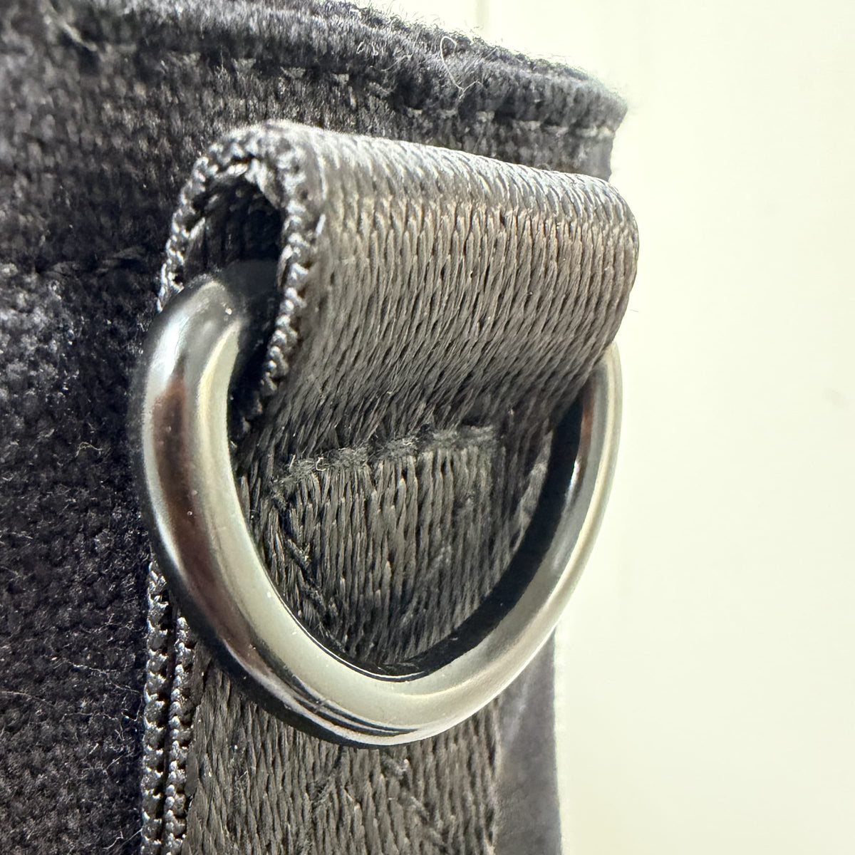 Cotton Convertible ITA Bag 15", black: close-up of a metal D-ring on a strap tab