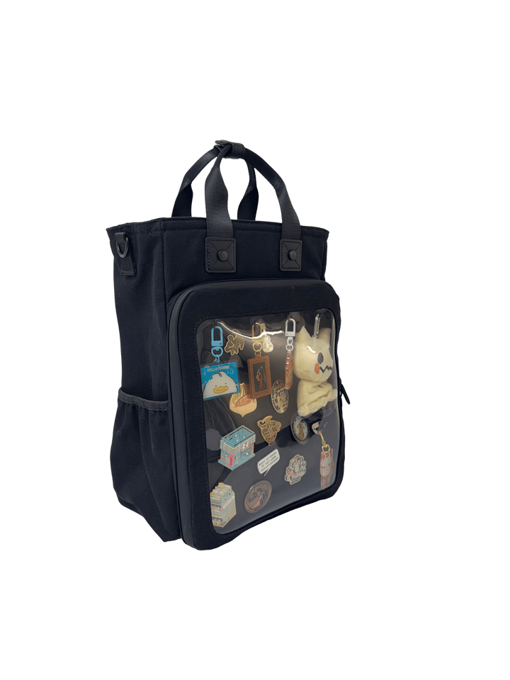 Cotton Convertible ITA Bag 15", black: three-quarter view with side bottle pocket, window filled