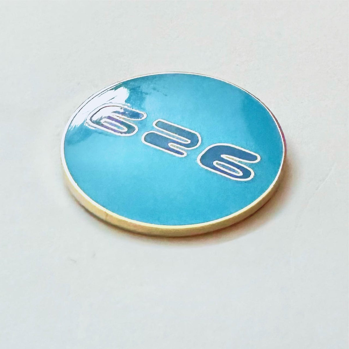 626 Orb Glow enamel pin, gold plating