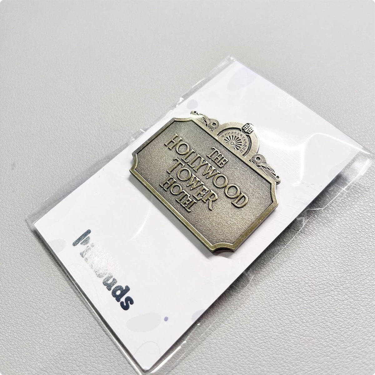 Hollywood Hotel enamel pin, antique gold plating