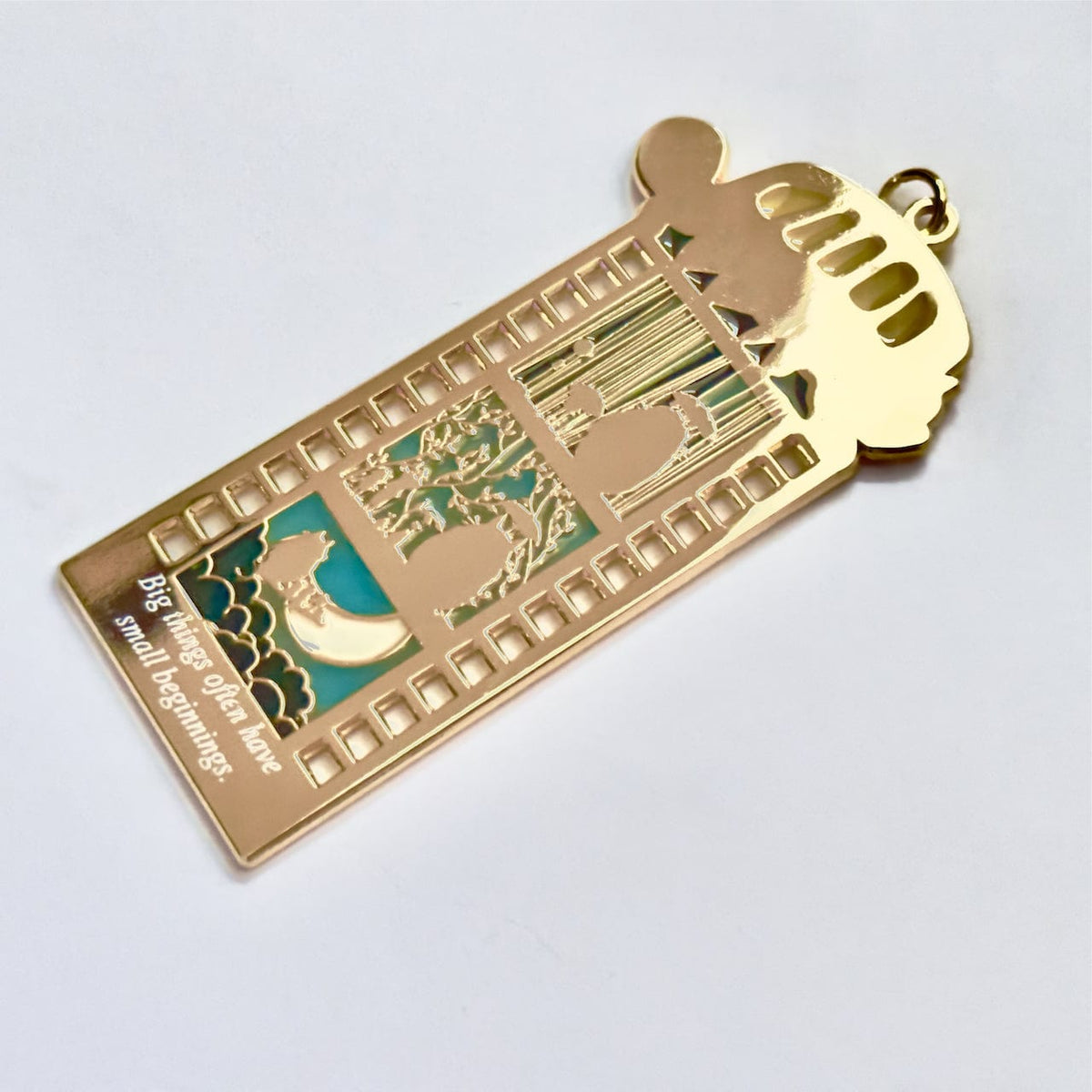 Lost Spirits Film Strip enamel pin, gold plating