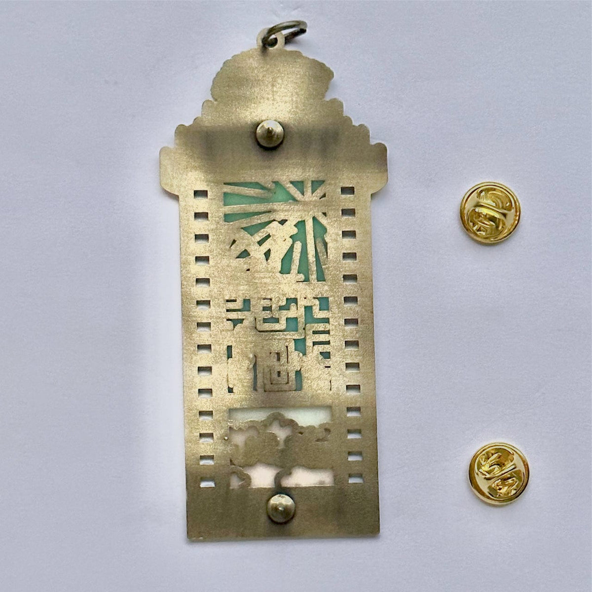 Lost Spirits Film Strip enamel pin, transparent