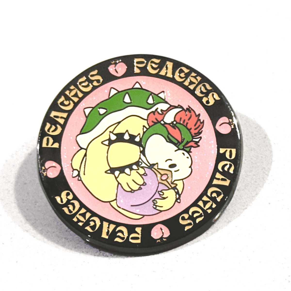 Peaches Bowser enamel pin, black plating