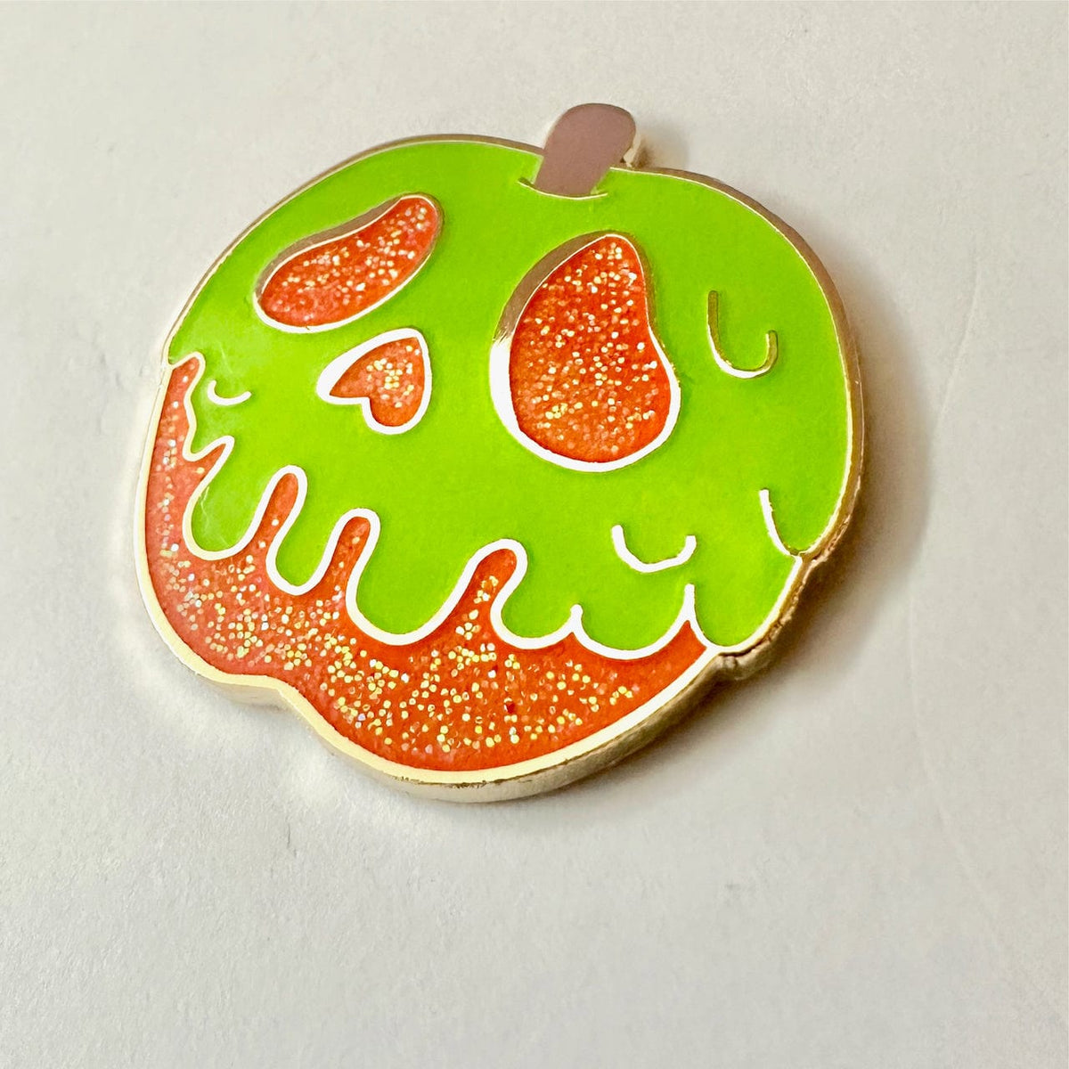 Poison Apple Glow enamel pin, gold plating