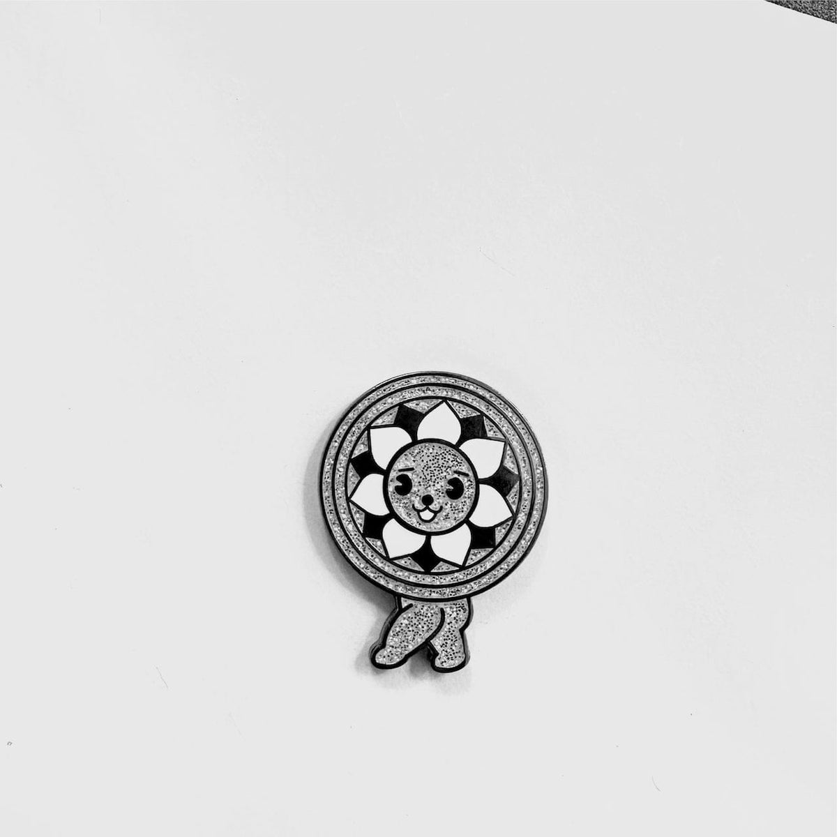 Sexy Tile Mascot enamel pin, black plating