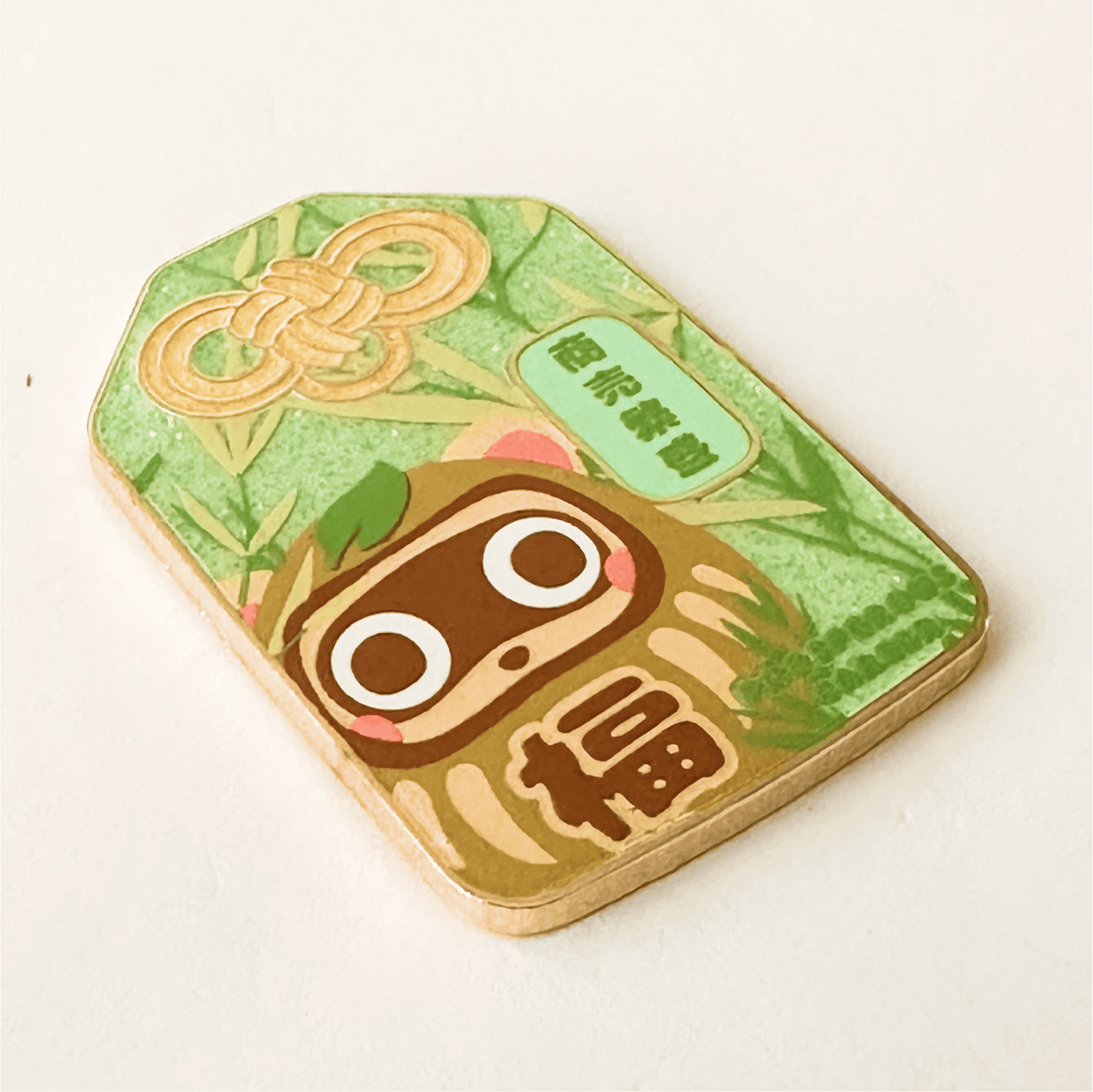 Triple Good Luck Tanuki Daruma Omamori enamel pin, gold plating
