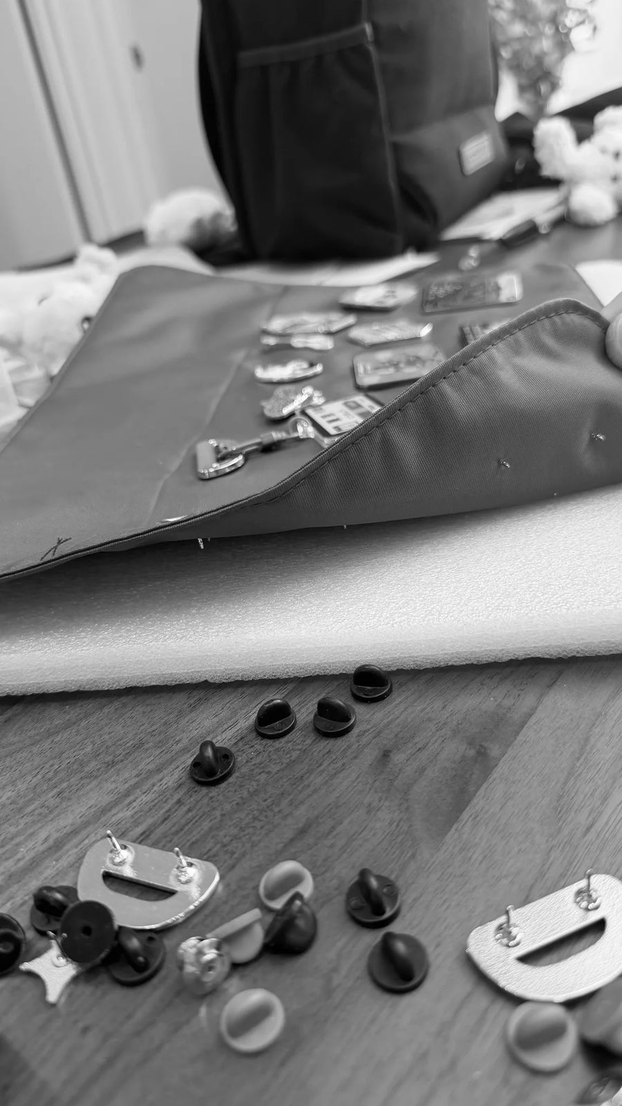 A pin pad on the foam, ready for the pin backs