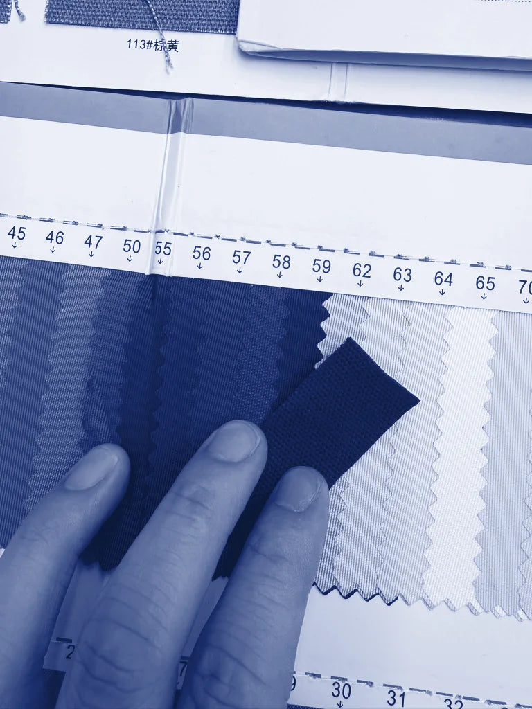 Matching a navy fabric against a colour card