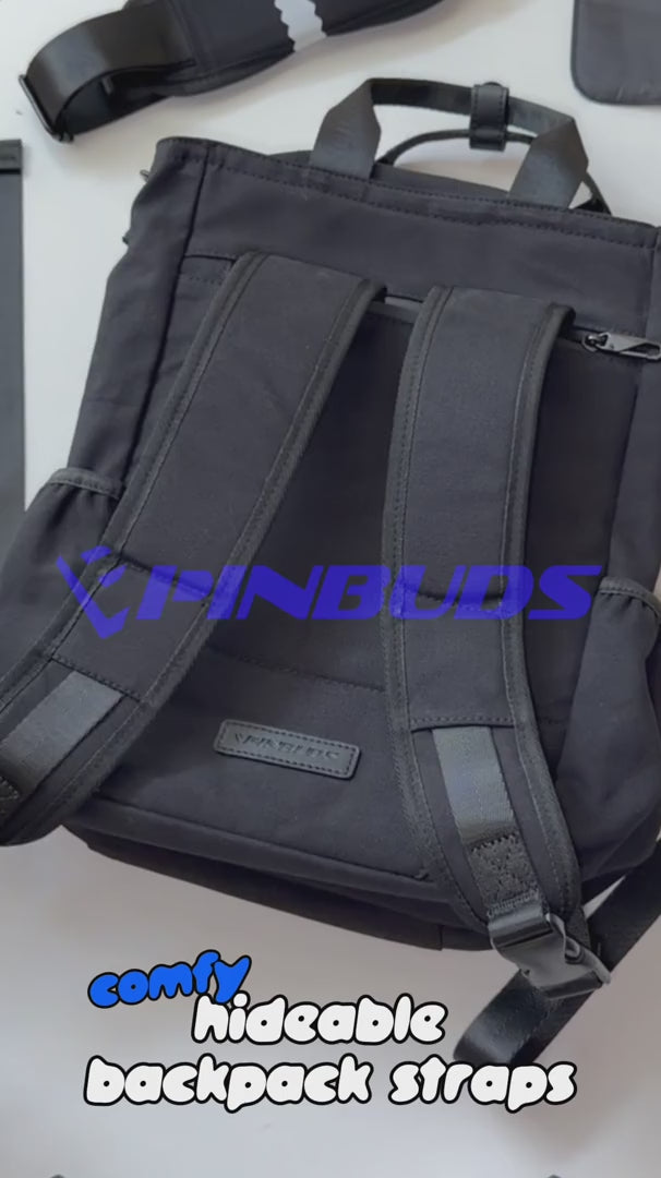 Backpack straps folding into the back pocket of the 15 inch Cotton ITA bag
