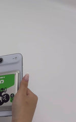 A Donburee x Pinbuds MagSafe phone wallet shaken hard on a phone: the cards stay in and the wallet stays on