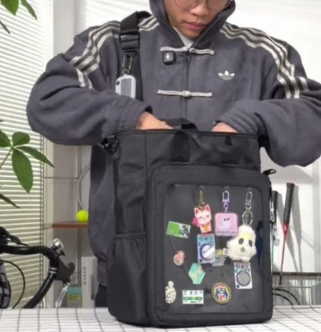 Sliding a laptop up to 15 inch and a water bottle into the 15 inch Cotton ITA bag