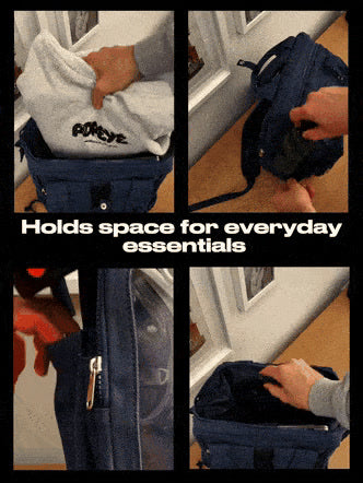 Dual Window ITA backpack 15", navy: a sweater in the wide main opening and a bottle in the side pocket
