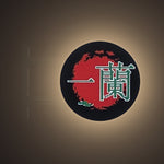 Ramen Shop Magnet Light by Pinbuds, lit up in the dark