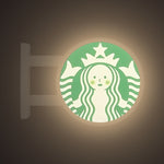 Smisbucks Magnet Light by Pinbuds, lit up in the dark