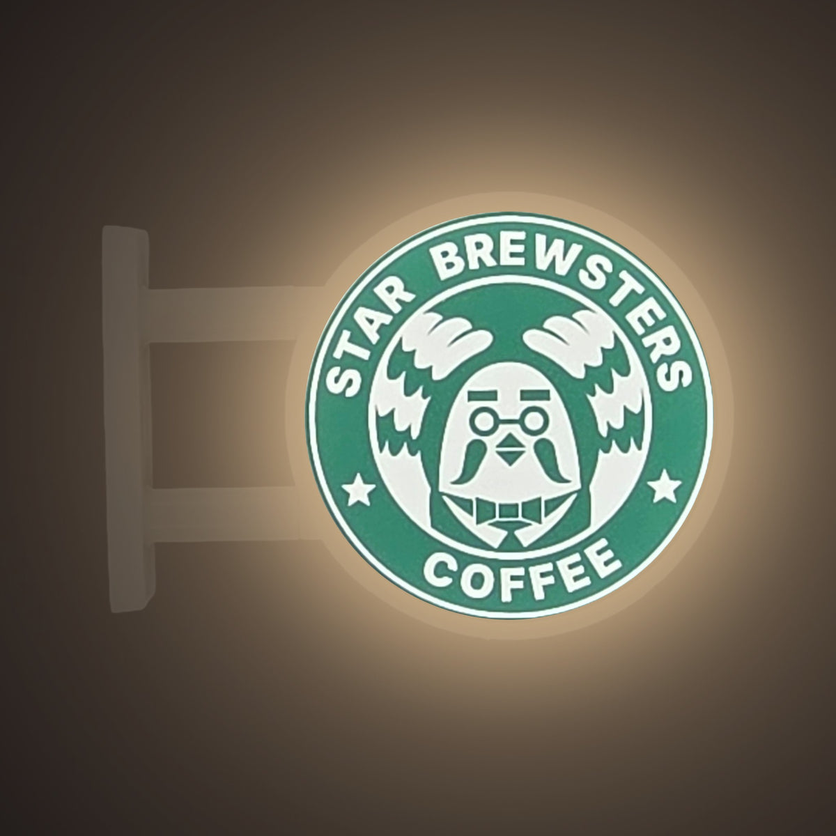 StarBrewsters Magnet Light by Pinbuds, lit up in the dark