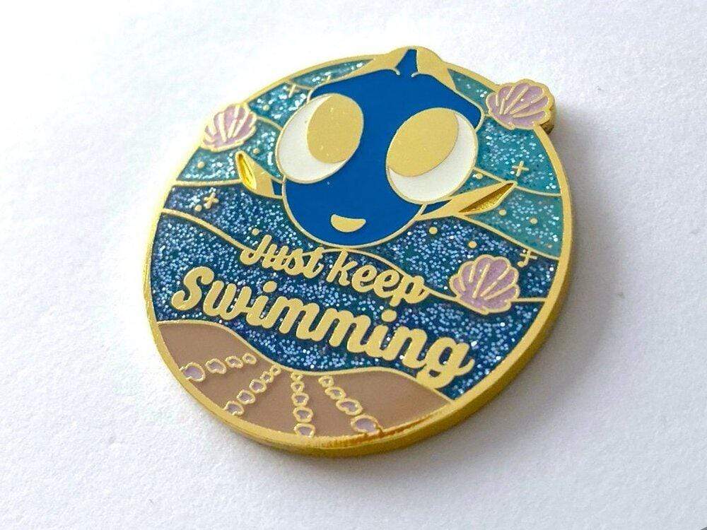 Swimming Fish enamel pin, designed in Sydney