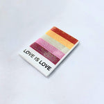 Lesbian Pride enamel pin, designed in Sydney