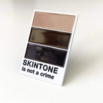 Skintone Is Not a Crime enamel pin, designed in Sydney
